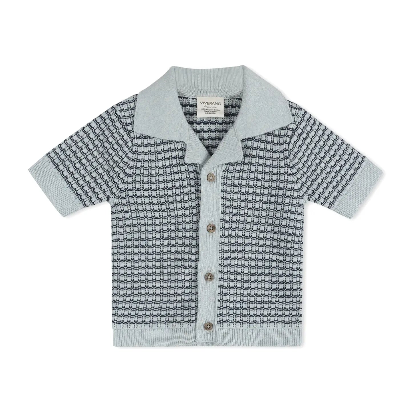 Baby cardigan with short sleeves and button details on a white background