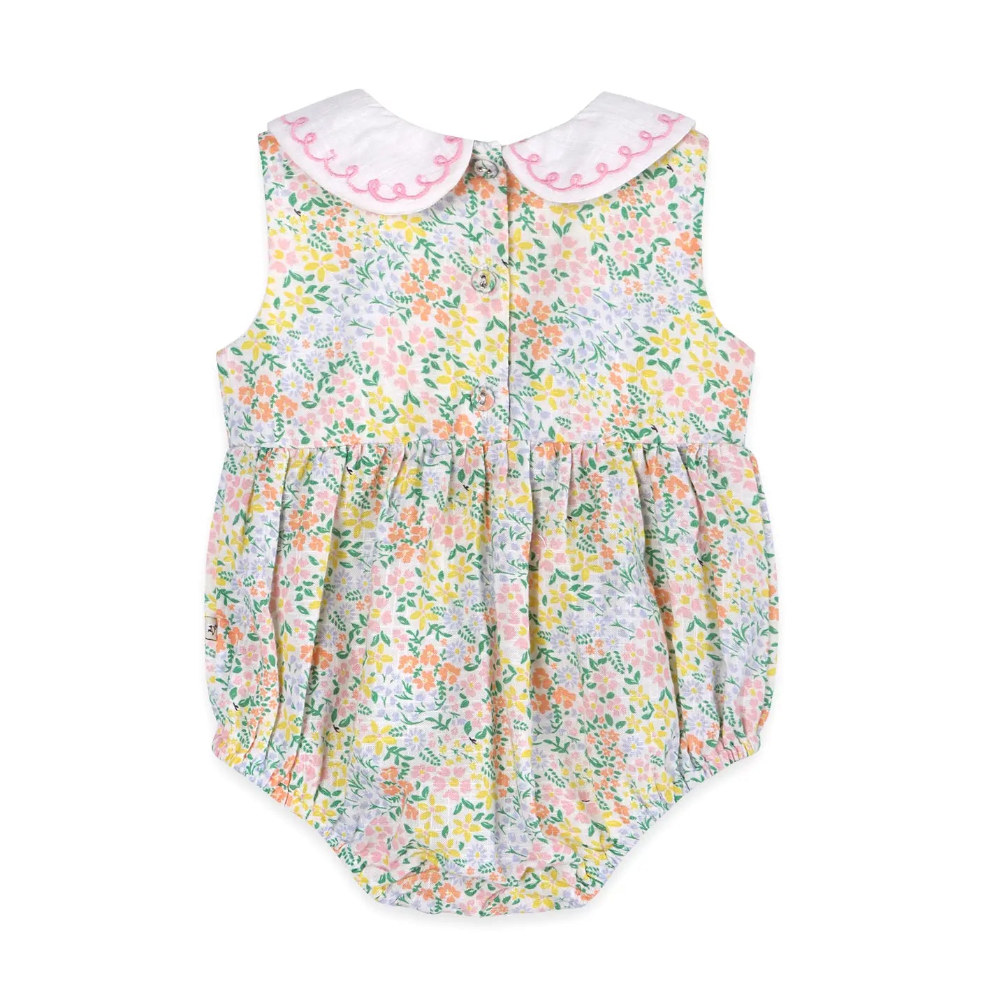 Floral baby romper with embroidered collar on a white background