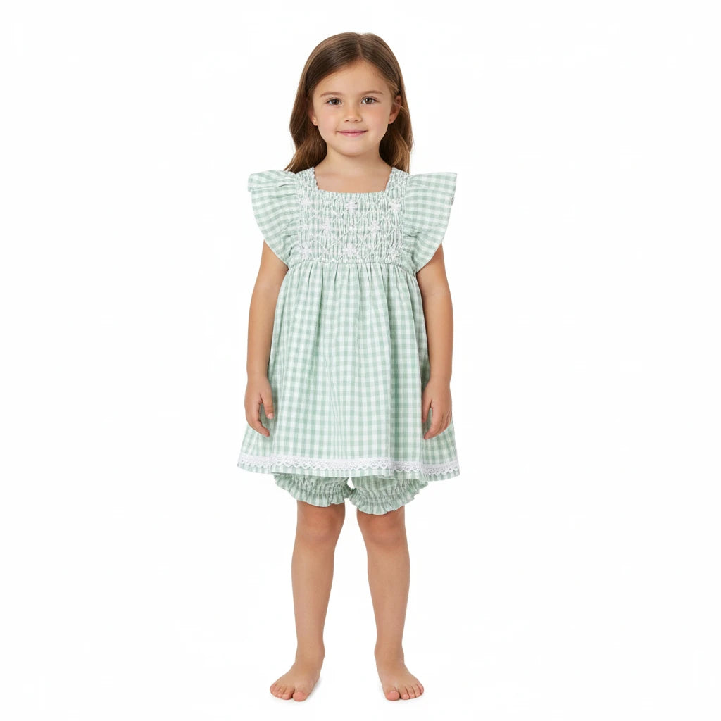 Green and white checkered baby dress with matching bloomers on a white background