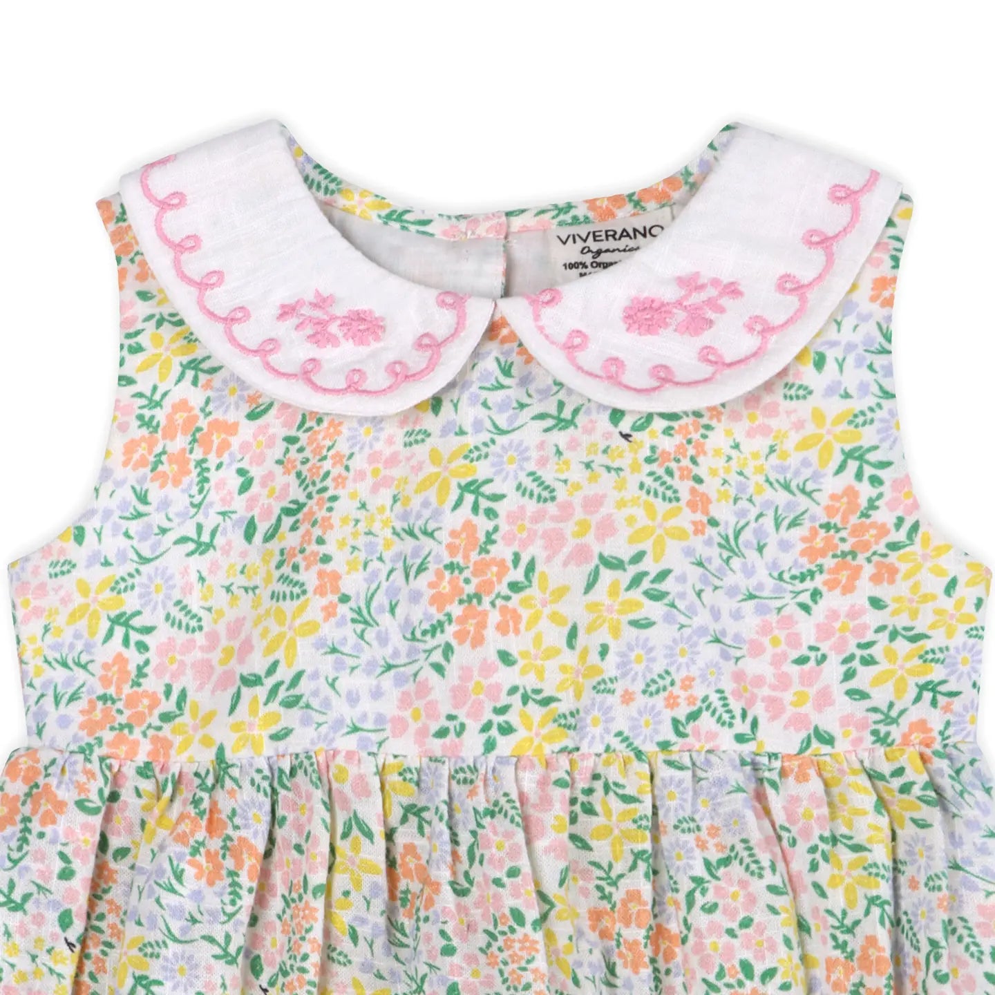 Floral dress with embroidered collar on a white background